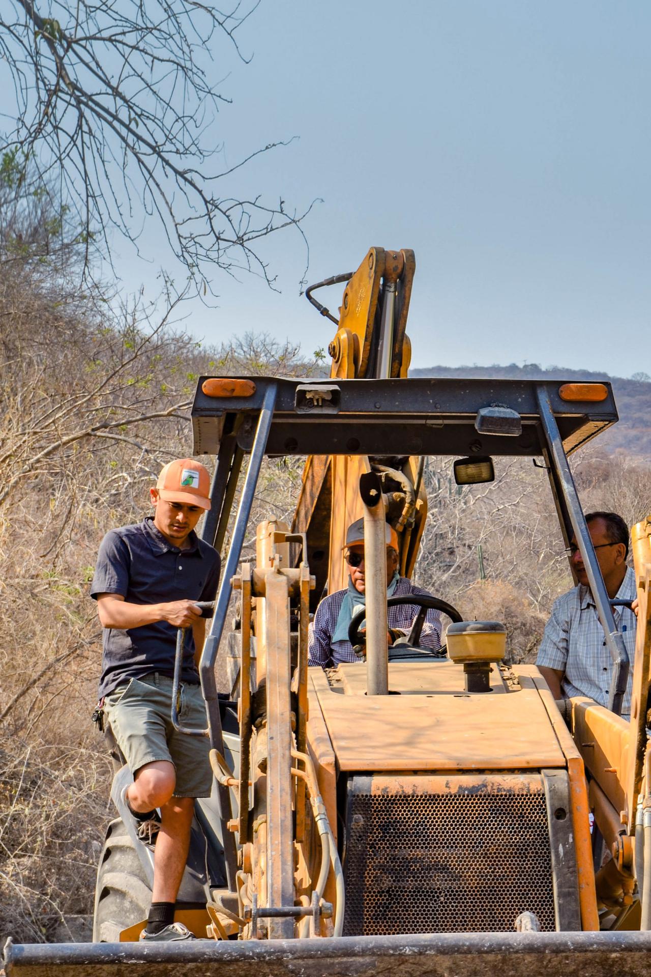 Men on a bulldozer