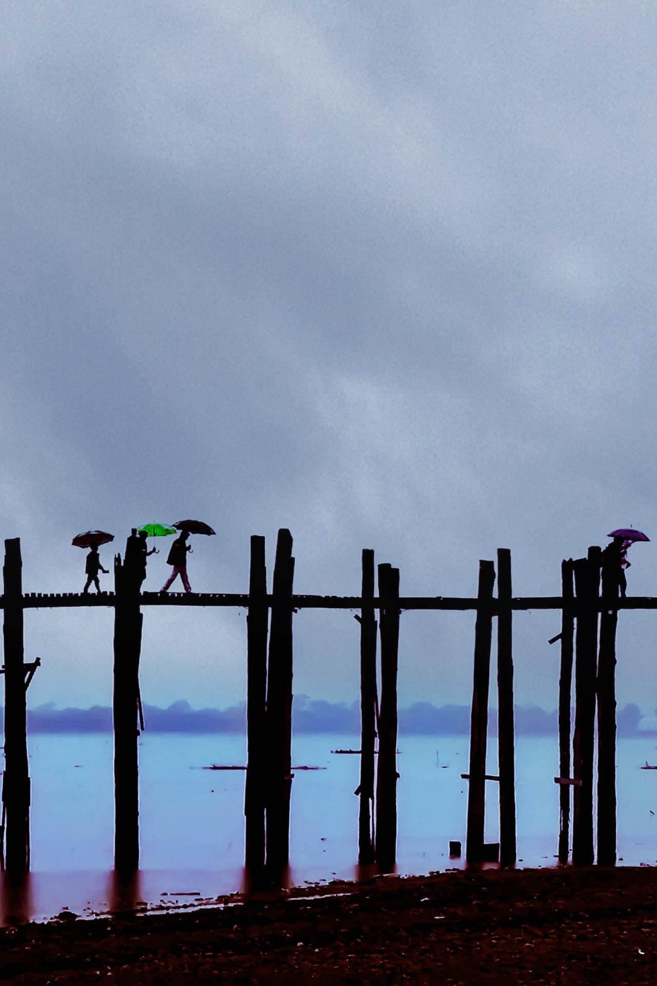 People crossing a bridge