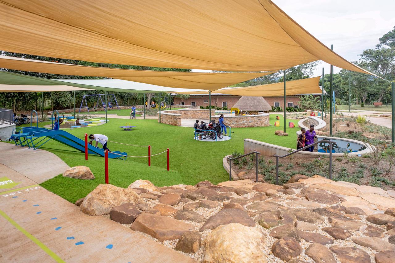Nannies and children at play on the Gem Foundation's new inclusive playground