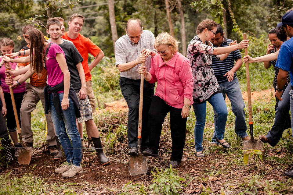 People digging with shovels