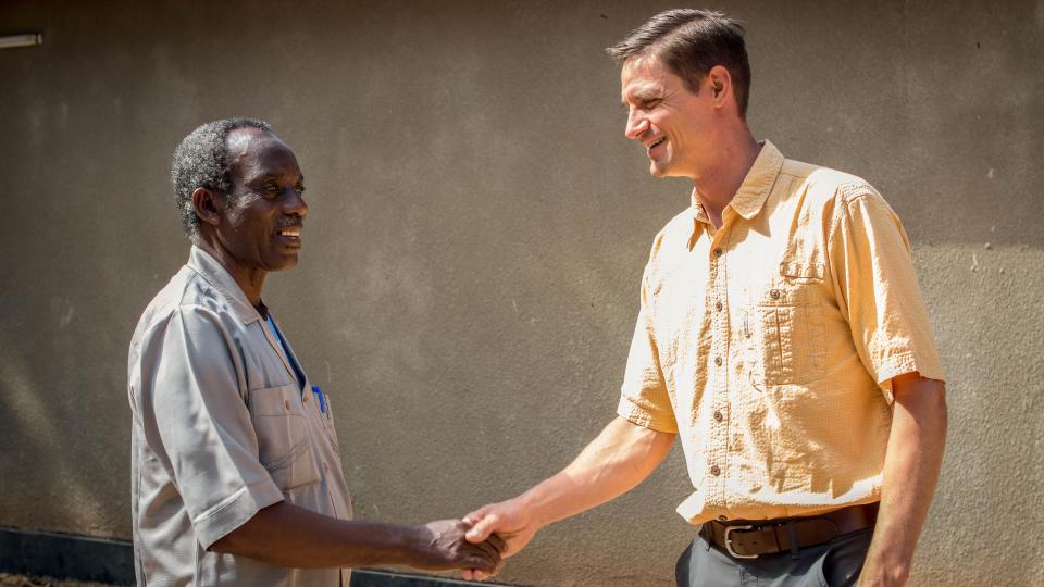 Andy Engebretson meeting Mr. Collins Kajisi