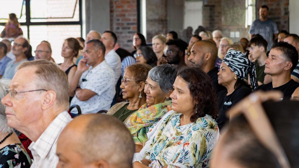 A group of people listening