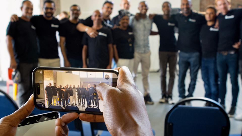 Taking a photo of a group of people