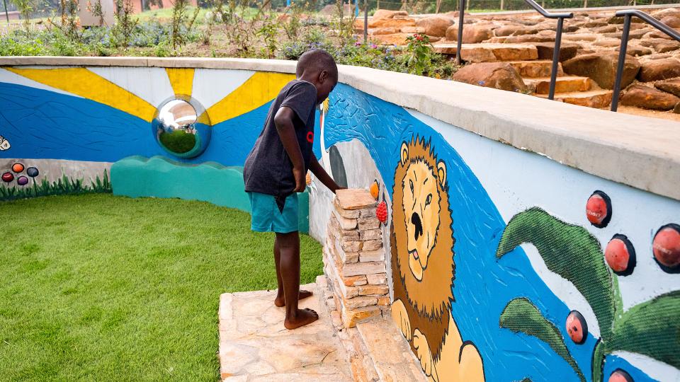 Child at the sensory wall