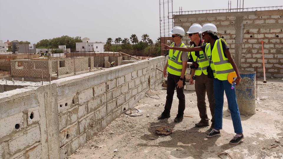 Pointing out construction progress