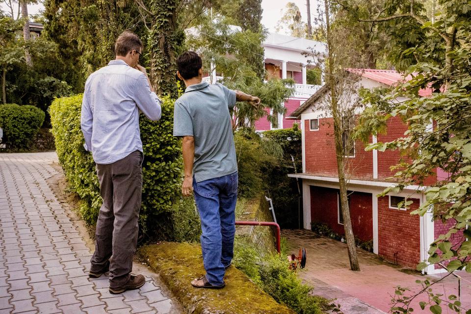 Client showing team member around