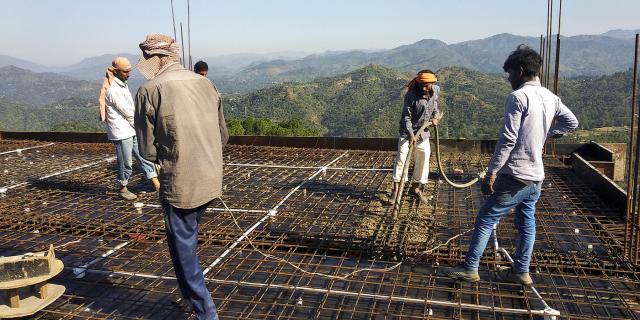 Labourers working on slab