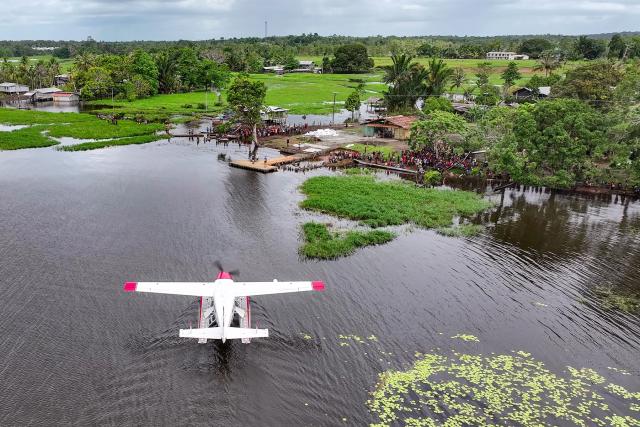 MAF amphibious plane landing in Papua New Guinea
