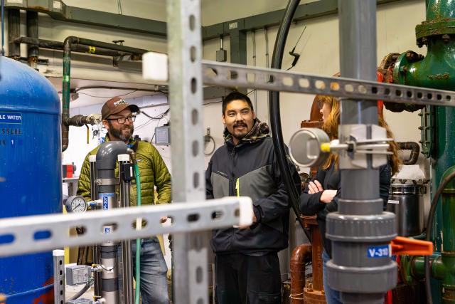 Shane, Travis, Judith at the Elim water plant